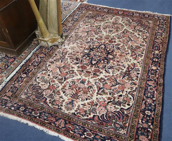 A pink and blue ground rug, 85 x 60in. 216cm x 148cm